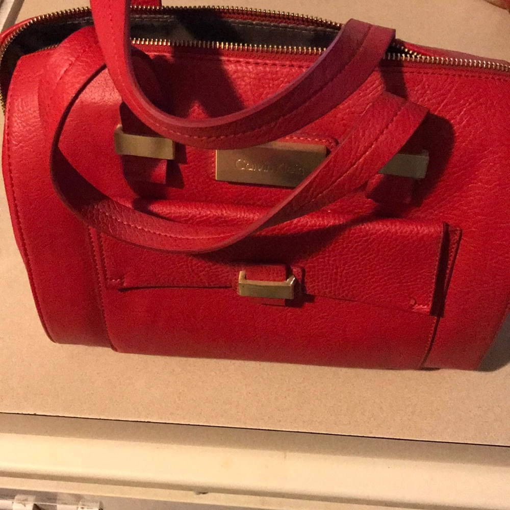 Red Calvin Klein pocketbook